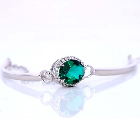S925 Silver plated in 18K Gold Emerald Bracelet Jewelry in an oval shape that synthetic emeralds featuring mimic natural growth patterns Wikie Jewelry